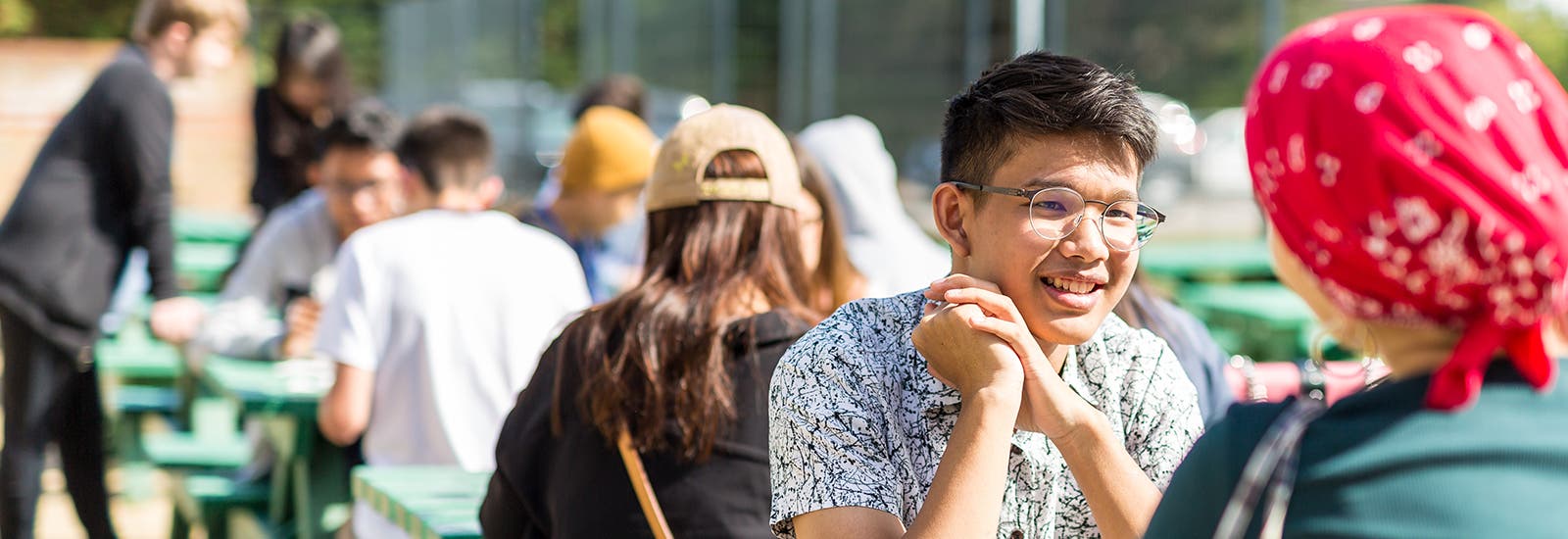 Three students studying in class