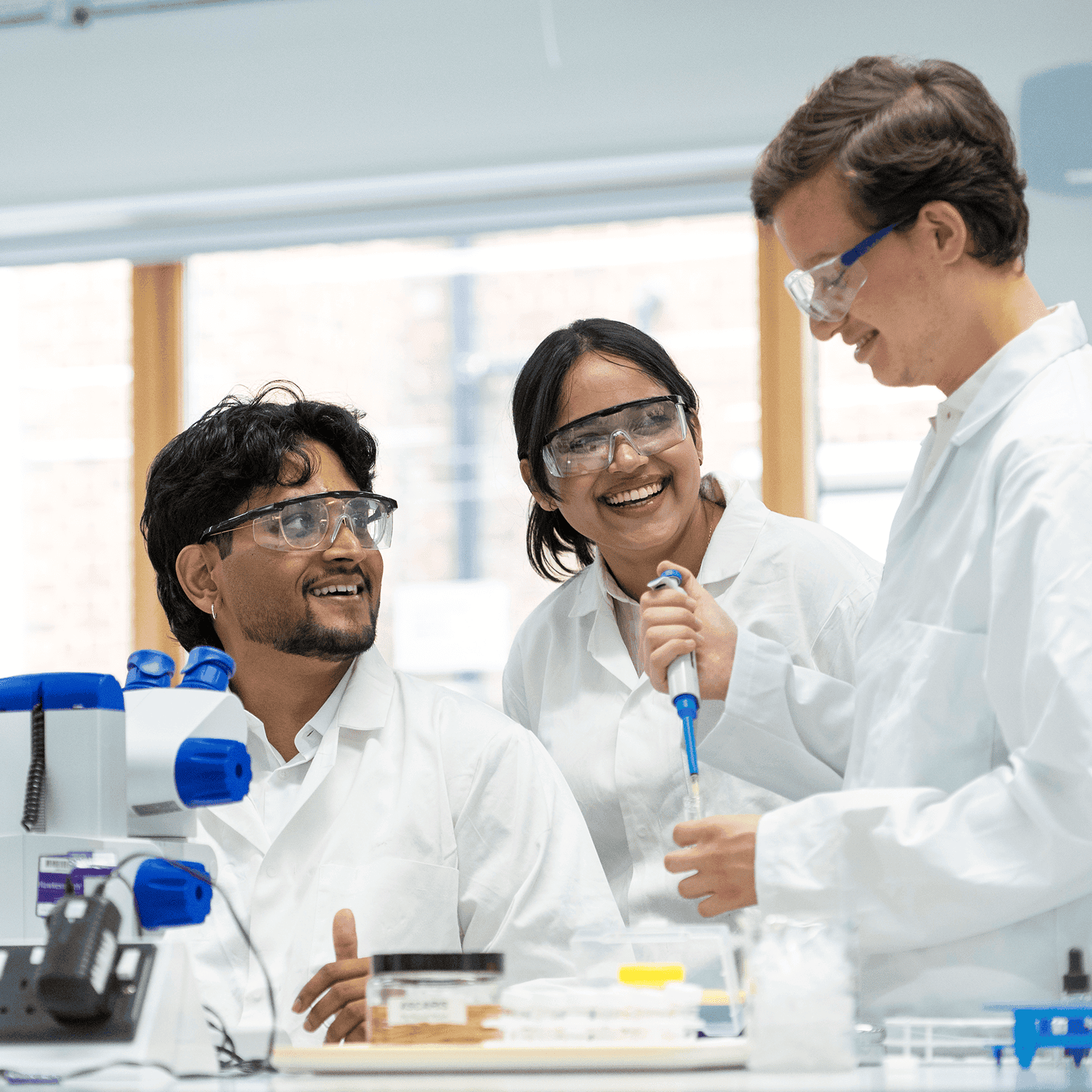 Three students in a lab