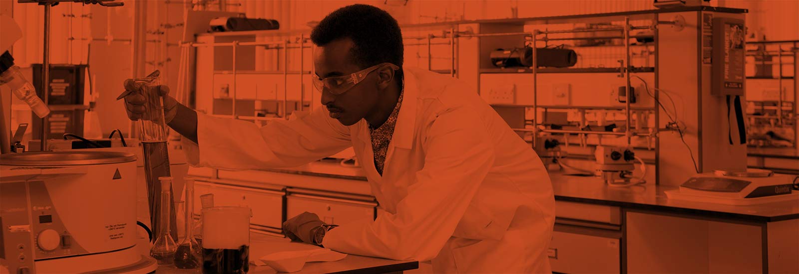 A University of Sussex student in a science lab