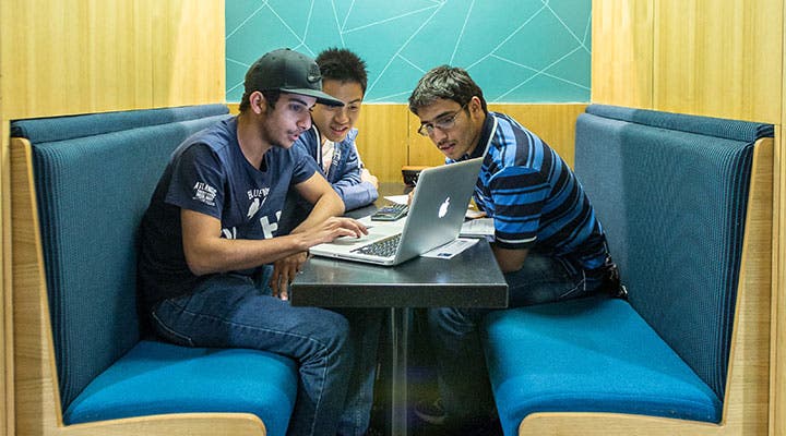 Students studying with laptop