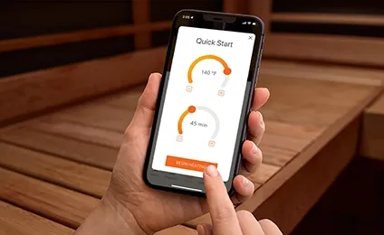 A person starts their Sunlighten sauna through the mobile application.