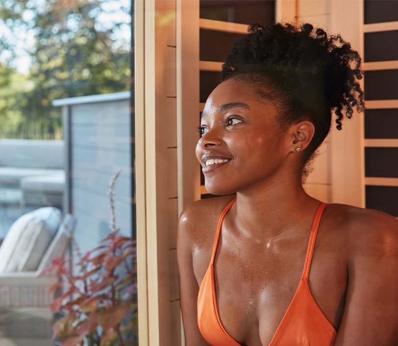 Happy stress free woman in sauna