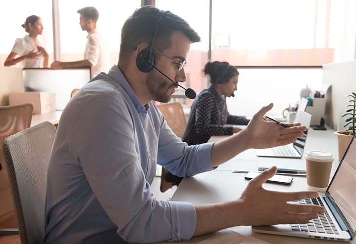 Man in call center talking