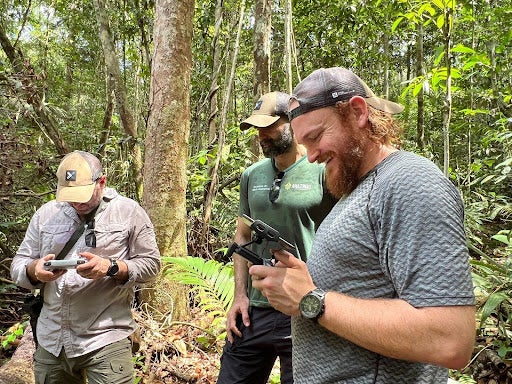 Marriott and Houlihan conduct aerial surveys of a potential finals testing site in Amazonas with Secretary Eduardo Taveira. These visual surveys help assess tree cover, forest structure, and heterogeneity. While assessing the forest, the team also observed the understory and the forest floor for biodiversity.