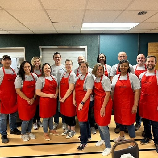 First Command volunteers prepping meals