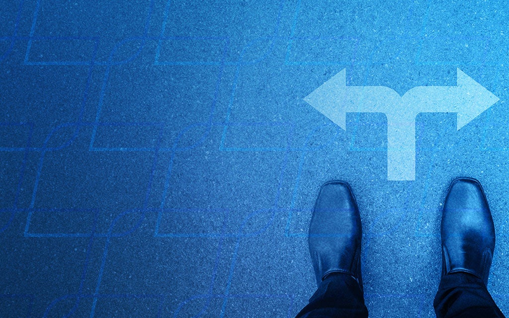 blue background with an individual standing near the directional arrows