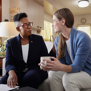 A First Command financial advisor helping a military spouse decide on an Asset Management Solution.