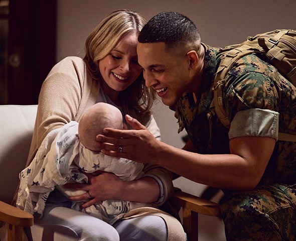 Military couple with a new baby.