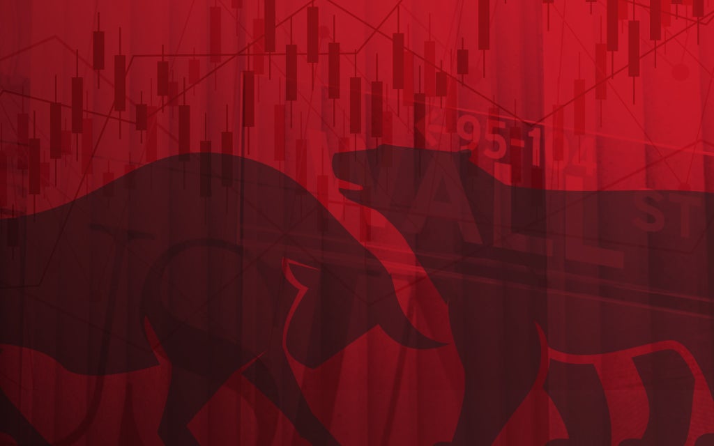 Image of a bull and bear on a red background.
