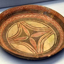 Decorated pottery plate from Tell Arpachiyah, Iraq, 5000-6000 BCE, found by Max Mallowan in 1933 and originally reassembled by Agatha Christie, British Museum (Wikimedia commons)