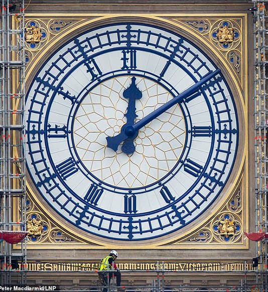Clock face of the Palace of Westminster clock tower, designed by Augustus Pugin and recently restored to its original Prussian blue paint (dailymail.co)