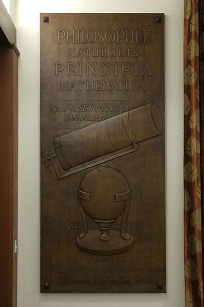 Bronze panel no. 6, based on the title page of Issac Newton’s Principia (1687), with Newton’s reflecting telescope added, cast by Bruno Bearzi, 1967, originally mounted on the south exterior annex wall, now in the auditorium, Linda Hall Library