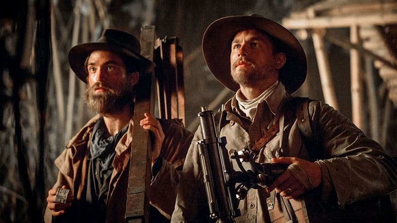 Percy Fawcett, played by Charlie Hunnam (right), with Henry Costin, who accompanied Fawcett on many expeditions, but not the last one, played by Robert Pattinson, still from the film, The Lost City of Z, directed by James Gray, 2016 (newyorker.com)