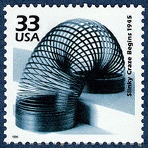 Postage stamp honoring the Slinky of the 1940s, issued by the USPS in 1999, in the series, “Celebrate the Century,” National Postal Museum, Smithsonian Institution (si.edu)