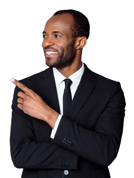 A business man smiling and pointing to his right