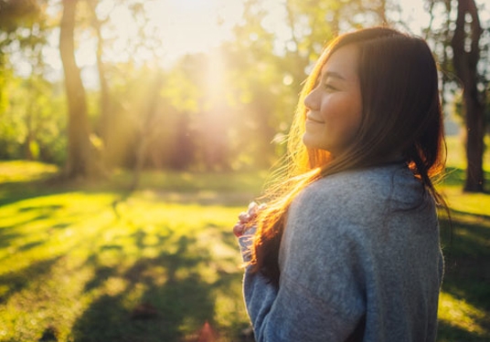 Woman smiling in sun