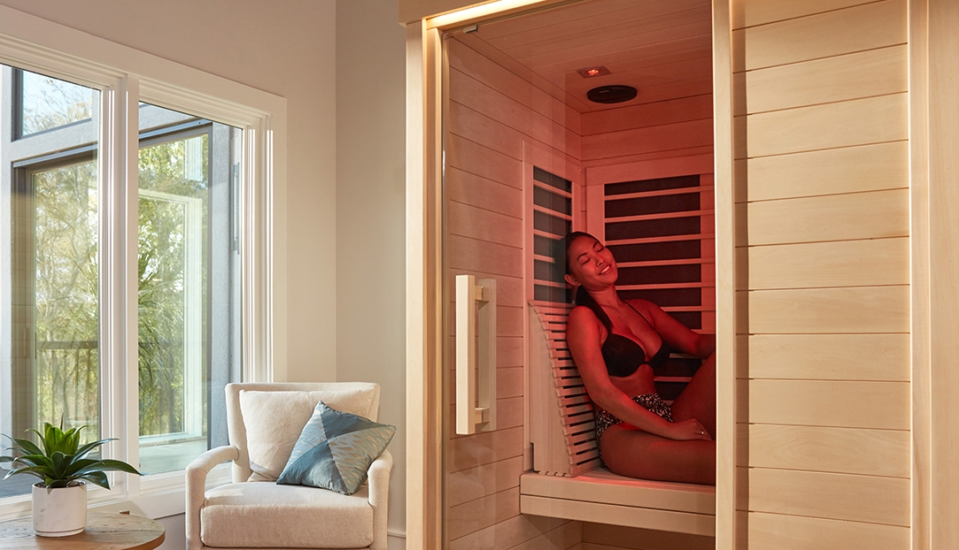 Woman in Signature Red Light Sauna