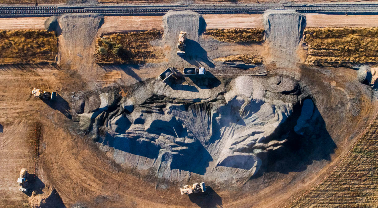 Mining trucks on a field