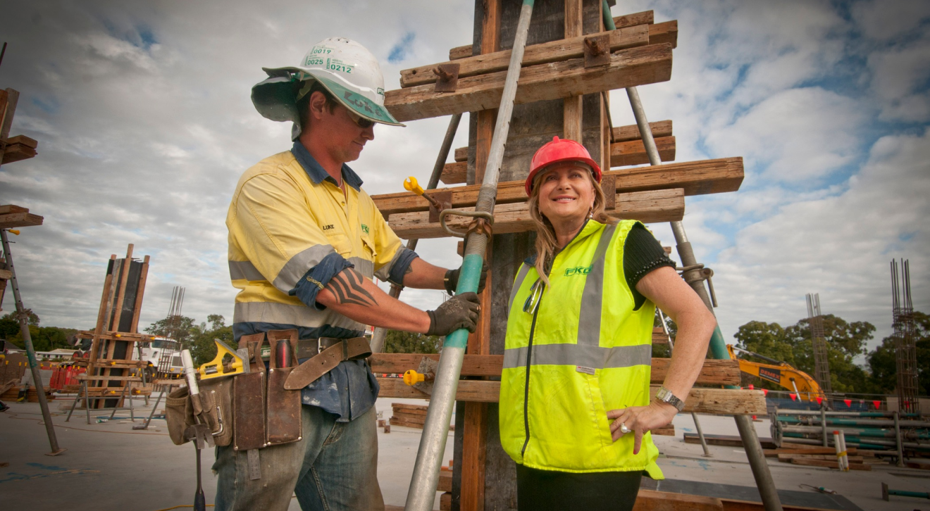 Sarina and worker in Hi-Viz