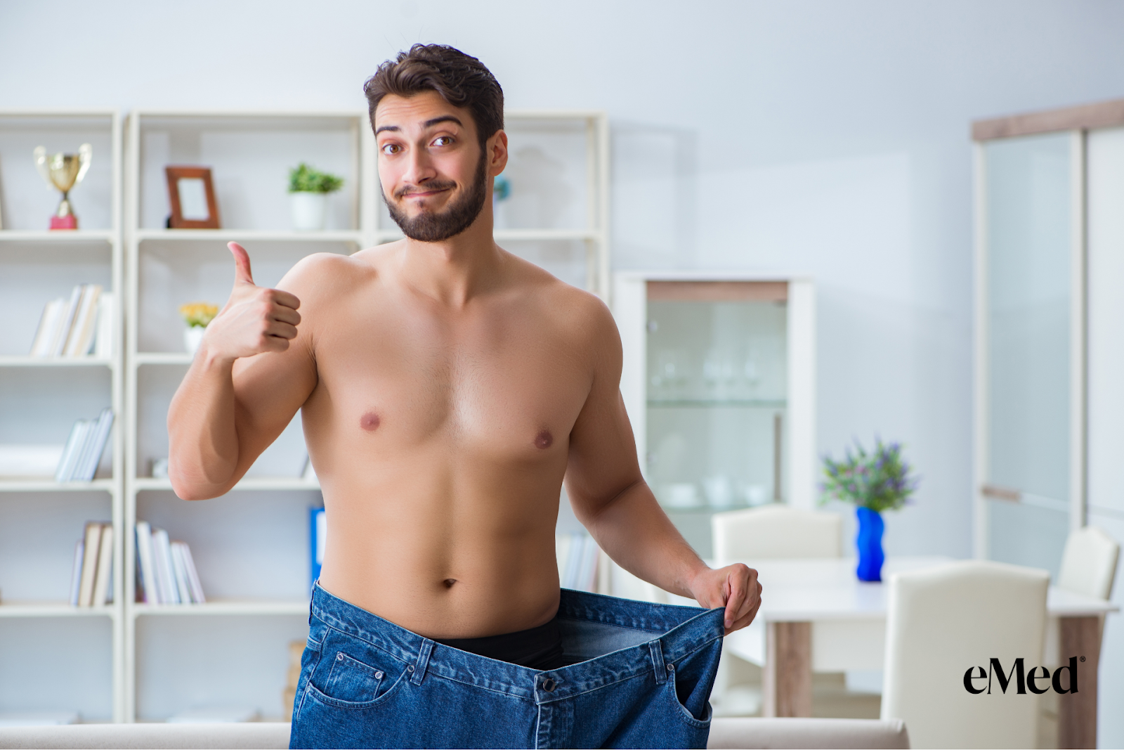 A man showing weight loss progress with unfit clothing