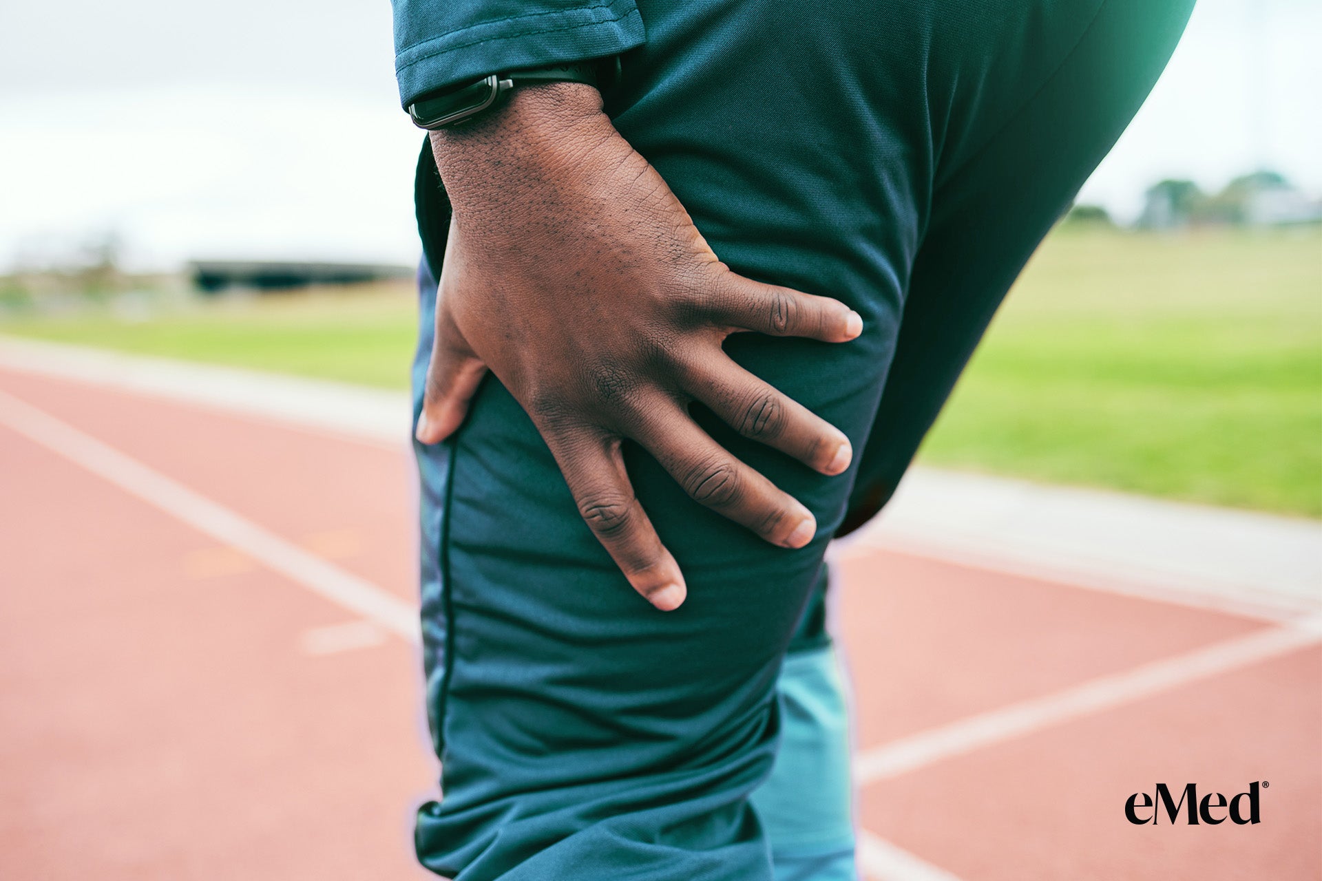 Man in pain with hamstring muscles with a highlighted area of strain